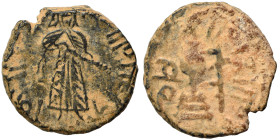 Umayyad Caliphate. Abd al-Malik ibn Marwan, AH 65-86 / 685-705 AD. Fals (bronze, 3.76 g, 17 mm). 'Standing Caliph' type. Caliph standing facing, beard...