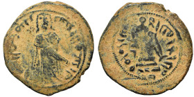 Umayyad Caliphate. Abd al-Malik ibn Marwan, AH 65-86 / 685-705 AD. Fals (bronze, 3.18 g, 20 mm). 'Standing Caliph' type. Caliph standing facing, beard...