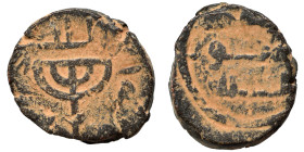 Umayyad Caliphate, circa 695-750. Fals (bronze, 2.62 g, 14 mm), Jerusalem. Menorah, Arabic legend around. Rev. legend in three lines. Nearly very fine...