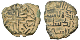 MENKUJAKIDS. Sulayman b. Ishaq, 1181. Fals (bronze, 3.34 g, 22 mm). Arabic legend, citing the Khaqanid ruler Akhsatan I. Rev. Ornamental cross with cr...