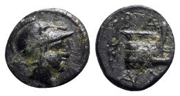 Kings of Macedon, Demetrios I Poliorketes (306-283 BC). Æ (11mm, 1.48g, 10h). Salamis. Helmeted head of Athena r. R/ Prow r.; aphlaston to l.; monogra...