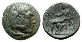 Epeiros, Ambrakia, late 2nd century BC. Æ (20mm, 7.75g, 6h). Head of Herakles r., wearing lion skin. R/ Apollo Aktios seated l. SNG Copenhagen 30; BMC...