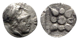 Asia Minor, Uncertain mint, 5th century BC. AR Hemiobol (6mm, 0.33g). Helmeted head of Athena r. R/ Star of four rays; pellets between rays; all withi...