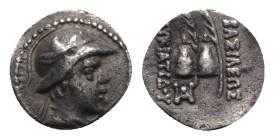 Baktria, Indo-Greek Kingdom. Eukratides I (c. 170-145 BC). AR Obol (9mm, 0.66g, 12h). Diademed, helmeted and draped bust r. R/ Caps of the Dioskouroi ...