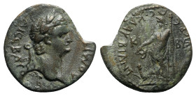 Domitian (81-96). Phrygia, Cibyra. Æ (21mm, 4.69g, 12h). Laureate head r.; c/m: wreath(?) within circular punch. R/ Dionysos standing l., holding cant...