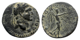 Domitian (Caesar, 69-81). Lycaonia, Iconium. Æ (17.5mm, 4.70g, 12h). Laureate head r. R/ Nike standing r. [on globe], holding wreath and palm. RPC II ...