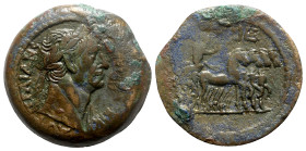 Trajan (98-117). Egypt, Alexandria. Æ Drachm (35mm, 21.94g, 12h), year 15 (AD 111/2). Laureate bust r. R/ Emperor, holding palm and sceptre, driving q...