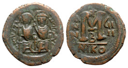Justin II (565-578). Æ 40 Nummi (29mm, 13.89g, 12h). Nicomedia, year 9 (573/4). Justin and Sophia, both nimbate, enthroned facing; Justin holding glob...
