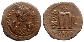 Maurice Tiberius (582-602). Æ 40 Nummi (29mm, 12.66g, 6h). Theopolis (Antioch), year 5 (586/7). Crowned bust facing, wearing consular robes, holding m...