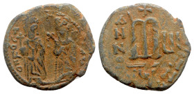Phocas (602-610). Æ 40 Nummi (27mm, 9.98g, 6h). Theoupolis (Antioch), year 6 (607/8). Phocas and Leontia standing facing, the Emperor holding globus c...