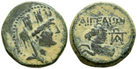 Cilicia, Aigeai. Ae21. (Ae. 6,78g/21mm). Siglo II-I a.C. (SNG Levante 1637; SNG Francia 2282; SNG von Aulock 5442 var). Anv: Busto velado y con corona...