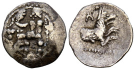 LYKAONIA, Laranda. Óbolo. (Ar. 0,64g/13mm). 324-323 a.C. (SNG von Aulock 5422). Anv: Baaltars sedente a izquierda portando espiga y racimo de uvas y c...
