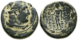 LYDIA, Sardis. Ae17. (Ae. 5,57g/17mm). 200-100 a.C. (SNG Von Aulock 3132). Anv: Busto laureado y drapeado de Heracles a derecha. Rev: Apolo de pie a l...