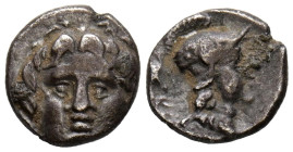 PISIDIA, Selge. Obolo. (Ar. 0,84g/10mm). 350-300 a.C. (SNG von Aulock 5278; SNG BnF 1932). Anv: Gorgoneion de frente. Rev: Cabeza de Atenas con casco ...