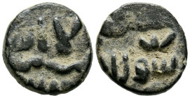 EMIRATO DEPENDIENTE DE CÓRDOBA, PERIODO DE GOBERNADORES. Anónimo. Felús. (Ae. 2,13g/13mm). S/D. (Frochoso II-e). Anv: لاالله/ لااله ا con adornos serp...