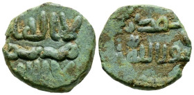 EMIRATO DEPENDIENTE DE CÓRDOBA, PERIODO DE GOBERNADORES. Anónimo. Felús. (Ae. 2,94g/14mm). S/D. (Frochoso II-e). Anv: لاالله/ لااله ا, adorno serpente...