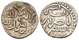ALMORÁVIDES, Tashfin Ibn 'Ali (537-539H). Quirate. (Ar. 0,95g/11mm). S/D. (Vives 1882; Benito Da2). Anv: 'Sahada' en dos lineas. Rev: Presenta a Tashf...