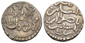 ALMORÁVIDES, Tashfin Ibn 'Ali (537-539H). Quirate. (Ar. 0,98g/11mm). S/D. (Vives 1882; Benito Da2). Anv: 'Sahada' en dos lineas. Rev: Presenta a Tashf...
