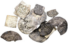 Interesante conjunto formado por 14 dirhams y fracciones, correspondientes a los peridos del Emirato, Califato e Imperio Almohade. Diferentes cecas, m...