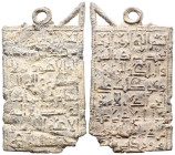 PERIODO CALIFAL O POSTERIOR. Amuleto rectangular. (Pb. 11,18g/50x28mm). Posiblemente Siglo X-XII. (Amuletos 55, Tipo A-III/IV). Placa rectangular de p...