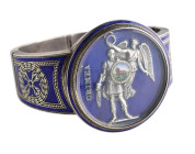 Victoria, a Crimean War Memorial Bracelet, c. 1854—56, in silver and enamels, with enamelled reverse of a Crimea medal at centre beneath a glazed oute...