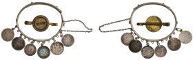 Germany, silver coins mounted on a bracelet: 20 pfennig (4), reverses engraved, Netherlands, 10 cents, 1896, and a silver medalet with a blue enamelle...