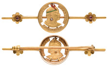 Peru, fifth-libra, date uncertain, openwork head at centre, with green enamelled head band, red enamelled feathers and applied paste earring, mounted ...