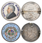 South Africa, Z.A.R., Kruger, halfcrowns (2), date obscured, brooch-mounted, obverse enamelled in natural colours; and 1892, brooch-mounted, reverse i...
