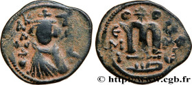 ARAB-BYZANTINE
Type : Fals 
Date : c. 670 
Mint name / Town : Émèse 
Metal : copper 
Diameter : 19,5  mm
Orientation dies : 6  h.
Weight : 3,64  g.
Ra...