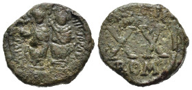 GIUSTINO II e SOFIA (565-578). Mezzo Follis per Roma. AE (g 4,65). Giustino e Sofia seduti di fronte su doppio trono. R/ XX; croce sopra, ROM sotto. M...