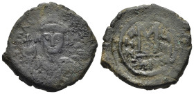 MAURIZIO TIBERIO (582-602). Follis per Nicomedia, anno 9 (590/1 d.C.). AE (g 12,30). Busto coronato e corazzato frontale, con globo crucigero. R/ Gran...