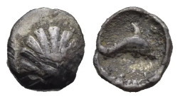 Calabria. Tarentum. Hemilitron. Circa 325-280 BC (Silver, 8.07 mm, 0.35 g). Scallop shell. Rev. Dolphin swimming right. HN Italy 980. Vlasto 1551. HGC...