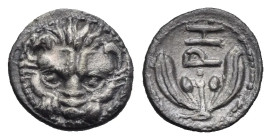 Bruttium. Rhegion. Litra. Circa 415-387 BC (Silver, 10.49 mm, 0.65 g). Facing lion's mask. Rev. PH, Olive-spray with two berries. HN Italy 2499. Herzf...