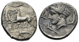 Sicily. Syracuse. Tetradrachm struck under Dionysios I. Circa 405-400 BC (Silver, 27.01 mm, 16.92 g). Charioteer, holding kentron and reins, driving f...