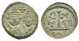 Heraclius with Heraclius Constantine, 610-641. 10 Nummi. Catania. AD 628-629 - year 19 (Bronze, 15.74 mm, 3.74 g). [Traces of legend], Facing crowned ...