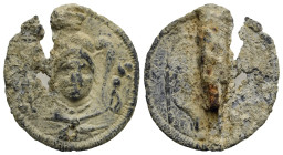 Magna Graecia (?), circa 4th - 3rd centuries BC. Seal or Brooch (Lead, 26.47 mm, 7.54 g). Helmeted head of Athena facing, surmounted by owl (?); on ri...