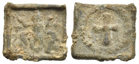 Early Christianity. Devotional Token or Amulet. 4th - 5th centuries AD (Lead, 17.83 mm length max, 3.65 g). The prophet Daniel standing facing, both h...