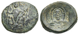 Italy. Messina. County of Sicily. Ruggero II, 1105-1130. Double Follaro. Circa 1112-1127 (Bronze, 19.47 mm, 6.31 g). Roger enthroned. Rev. Facing bust...