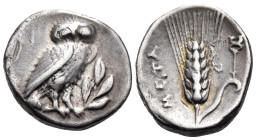 LUCANIA. Metapontion. Circa 325-275 BC. Drachm (Silver, 16 mm, 3.21 g, 8 h). Owl, with wings closed, standing to right on olive branch; in upper left ...