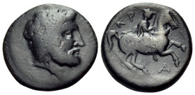 THESSALY. Krannon. 4th century BC . (Bronze, 19 mm, 5.18 g, 3 h). Laureate and bearded head of Poseidon or Zeus to right. Rev. KP/A Rider wearing chla...