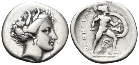 LOKRIS. Lokris Opuntii. Circa 338-316 BC. Triobol (Silver, 16 mm, 2.53 g, 12 h). Head of Persephone to right, wearing grain wreath and pendant earring...