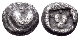 KYRENAIKA. Kyrene. Circa 500-480 BC. Obol (Silver, 7 mm, 0.63 g, 9 h). Silphium fruit with pellet above and below. Rev. Facing head of a lion with pel...