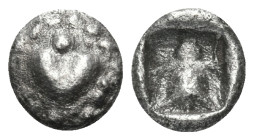 KYRENAIKA. Kyrene. Circa 500-480 BC. Tetartemorion (Silver, 6 mm, 0.27 g). Silphium fruit. Rev. Flower with two leaves(?). BMC -. SNG Copenhagen -. Ex...
