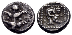 KYRENAIKA. Kyrene. Circa 480-435 BC. Obol (Silver, 8 mm, 0.62 g, 12 h). Silphium plant with two pairs of leaves and five flowers. Rev. Bearded head of...
