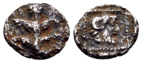 KYRENAIKA. Kyrene. Circa 480-435 BC. Hemiobol (Silver, 7 mm, 0.24 g, 7 h). Silphium plant with two pairs of leaves and flower at top. Rev. Bearded hea...