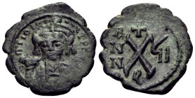 Maurice Tiberius, 582-602. Decanummium (Bronze, 20 mm, 2.70 g, 12 h), Theoupolis (Antioch), Dated regnal year GI (7) = 588/589. Blundered legend Crown...