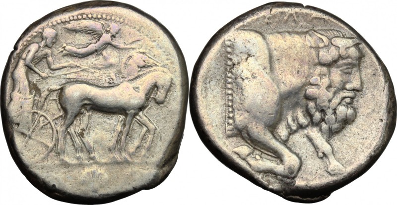 Sicily. Gela. AR Tetradrachm, c. 450-440 BC. D/ Charioteer driving quadriga righ...