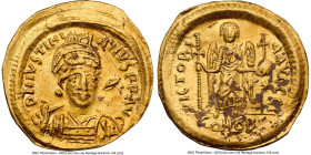 Justinian I the Great (AD 527-565). AV solidus (21mm, 3.99 gm, 7h). NGC Choice XF 3/5 - 2/5, flan flaws, clipped. Constantinople, 10th officina, AD 52...