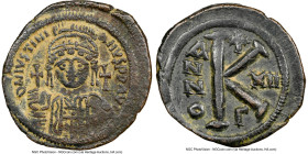 Justinian I the Great (AD 527-565). AE half-follis or 20 nummi (32mm, 7h). NGC Choice VF. Constantinople, dated Regnal Year 12 (AD 538/9), 3rd officin...