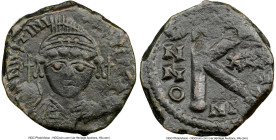 Justinian I the Great (AD 527-565). AE half-follis or 20 nummi (24mm, 7h). NGC Choice VF. Nicomedia. D N IVSTINI-ANVS PP AVG, helmeted and cuirassed b...